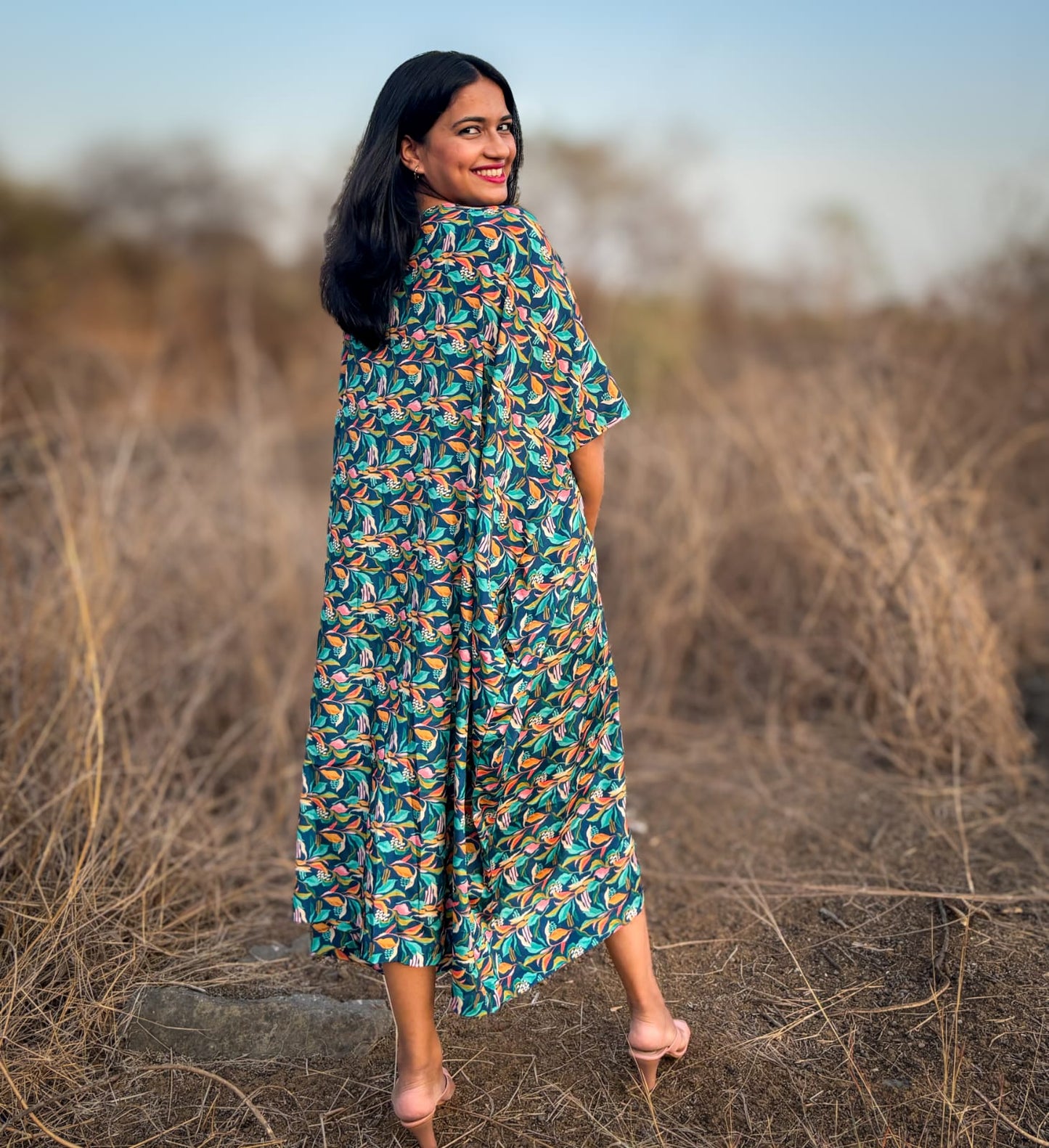 Crepe Kaftan Dress inspired by Water Hyacinth in tropical lagoons. Free-flowing and stylish, offering comfort and elegance. Perfect for all occasions with a unique vibrant floral print. #CrepeKaftan #TropicalFashion #WaterHyacinthPrint #SummerStyle