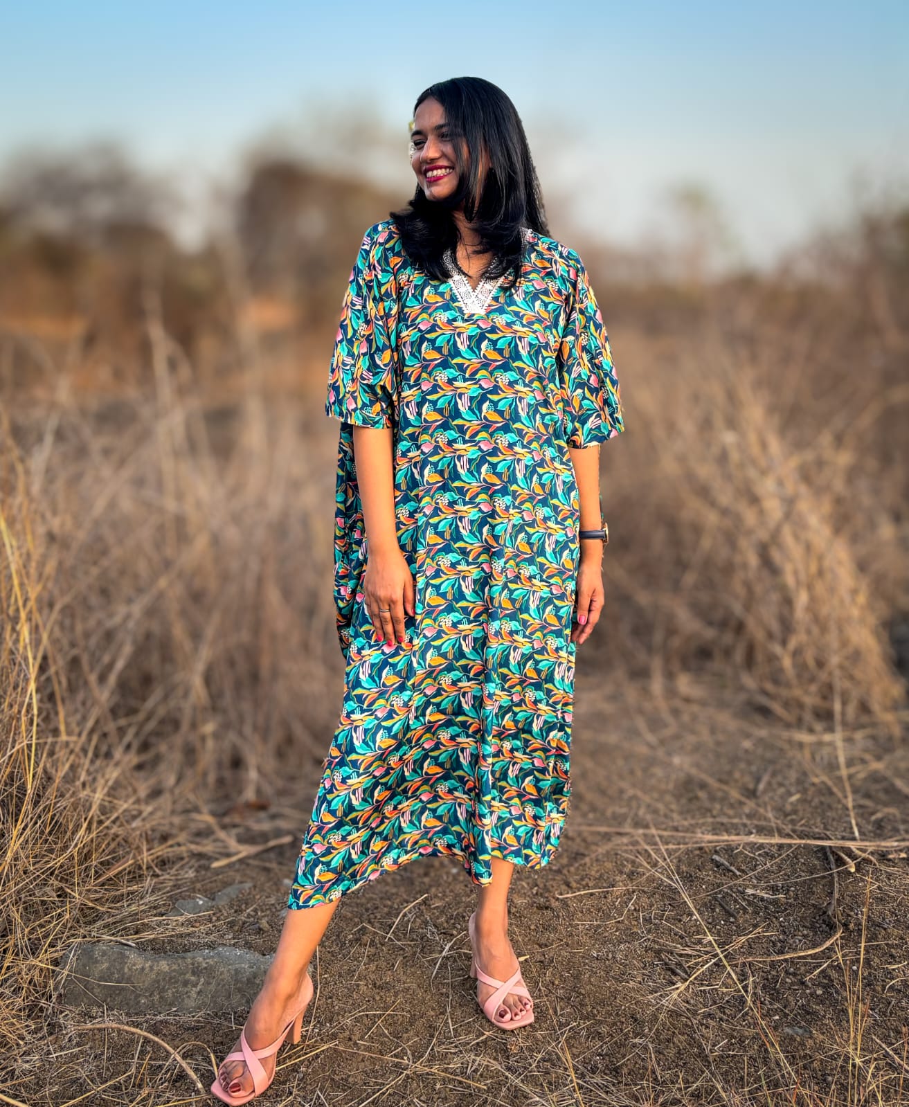 Crepe Kaftan Dress inspired by Water Hyacinth in tropical lagoons. Free-flowing and stylish, offering comfort and elegance. Perfect for all occasions with a unique vibrant floral print. #CrepeKaftan #TropicalFashion #WaterHyacinthPrint #SummerStyle