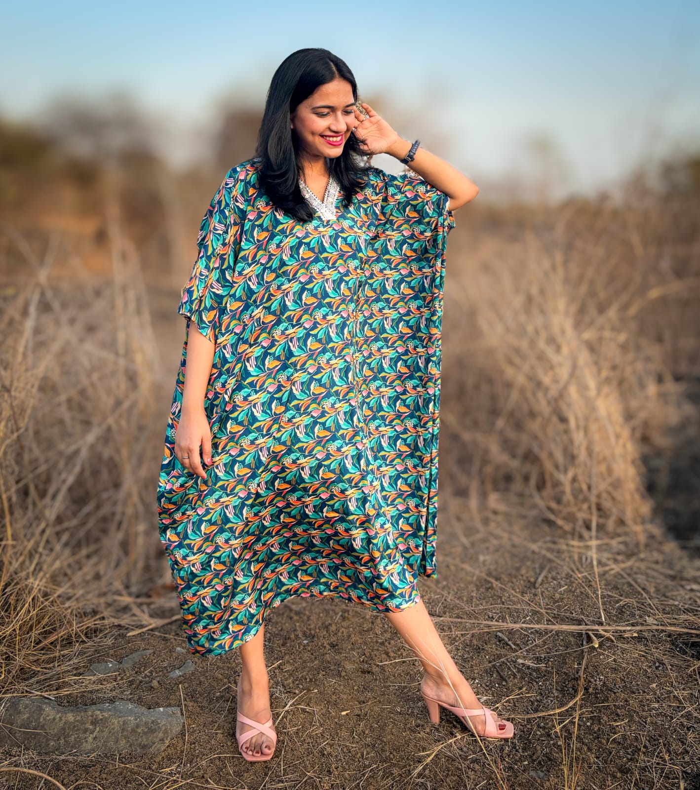 Crepe Kaftan Dress inspired by Water Hyacinth in tropical lagoons. Free-flowing and stylish, offering comfort and elegance. Perfect for all occasions with a unique vibrant floral print. #CrepeKaftan #TropicalFashion #WaterHyacinthPrint #SummerStyle