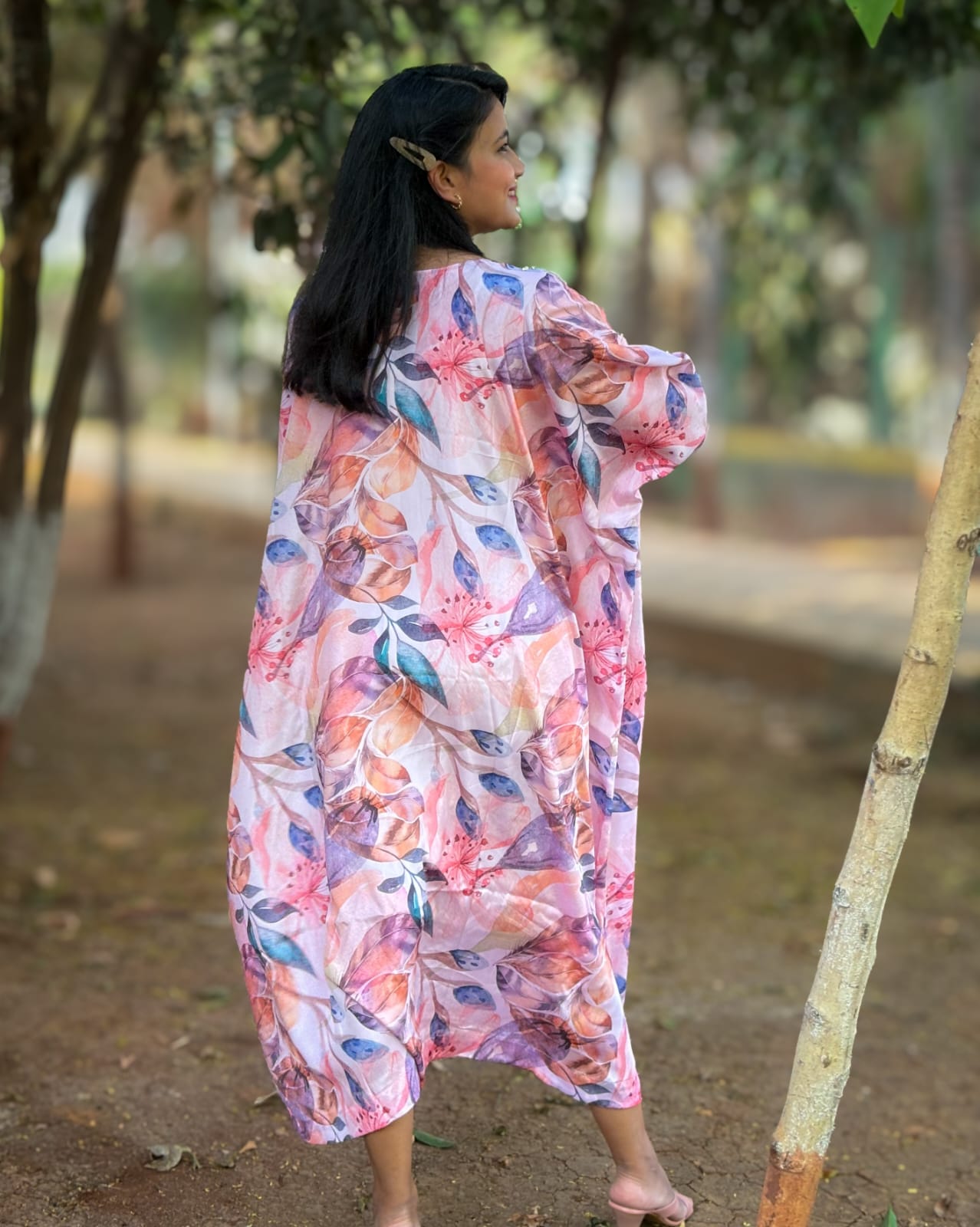 Pink Kaftan with vibrant floral print inspired by Coral Cove. Perfect for everyday outings, adding joy and confidence to your wardrobe. #PinkKaftan #CoralCoveInspired #FloralPrint #Fashionista #ConfidenceBoost