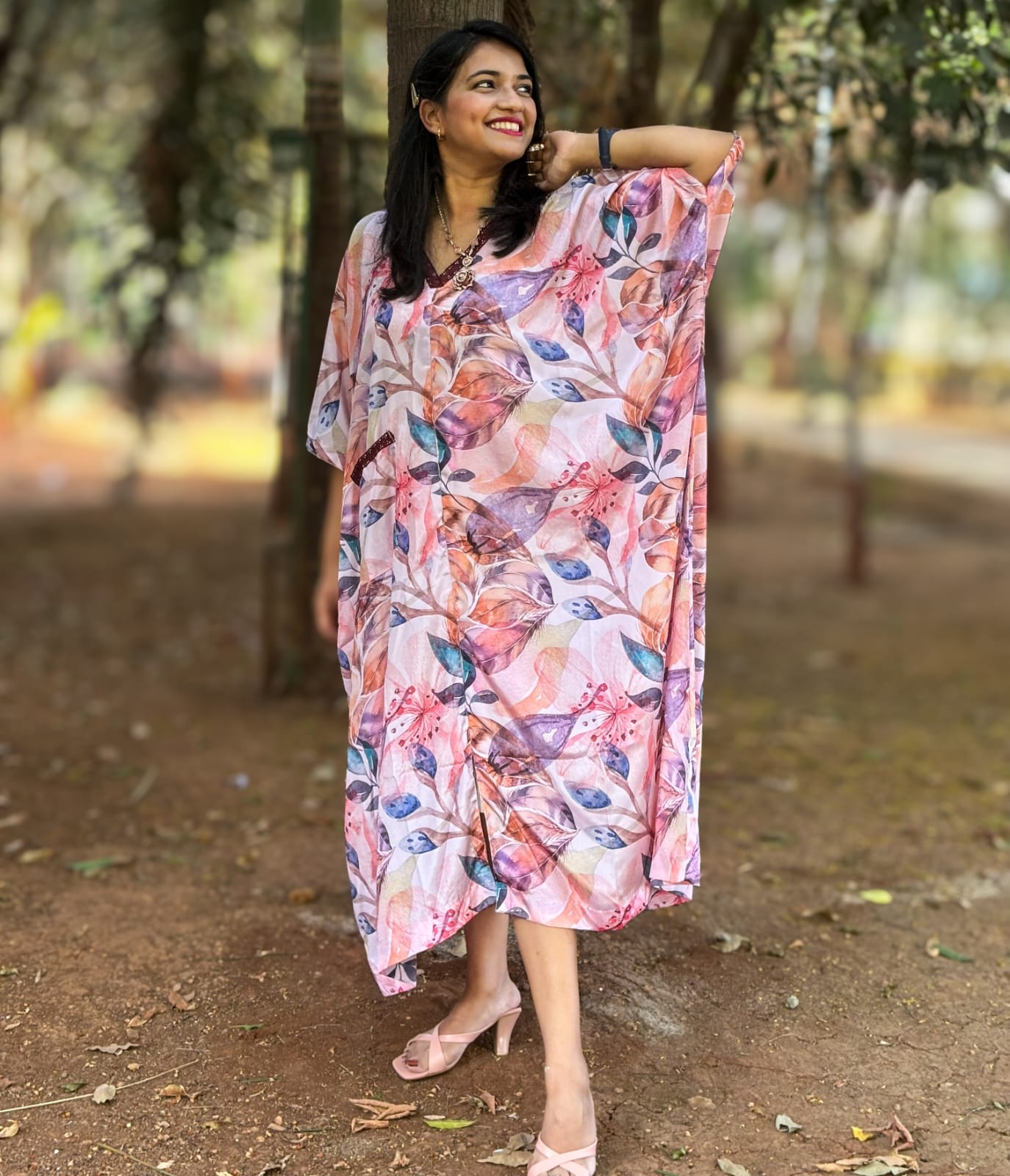 Pink Kaftan with vibrant floral print inspired by Coral Cove. Perfect for everyday outings, adding joy and confidence to your wardrobe. #PinkKaftan #CoralCoveInspired #FloralPrint #Fashionista #ConfidenceBoost