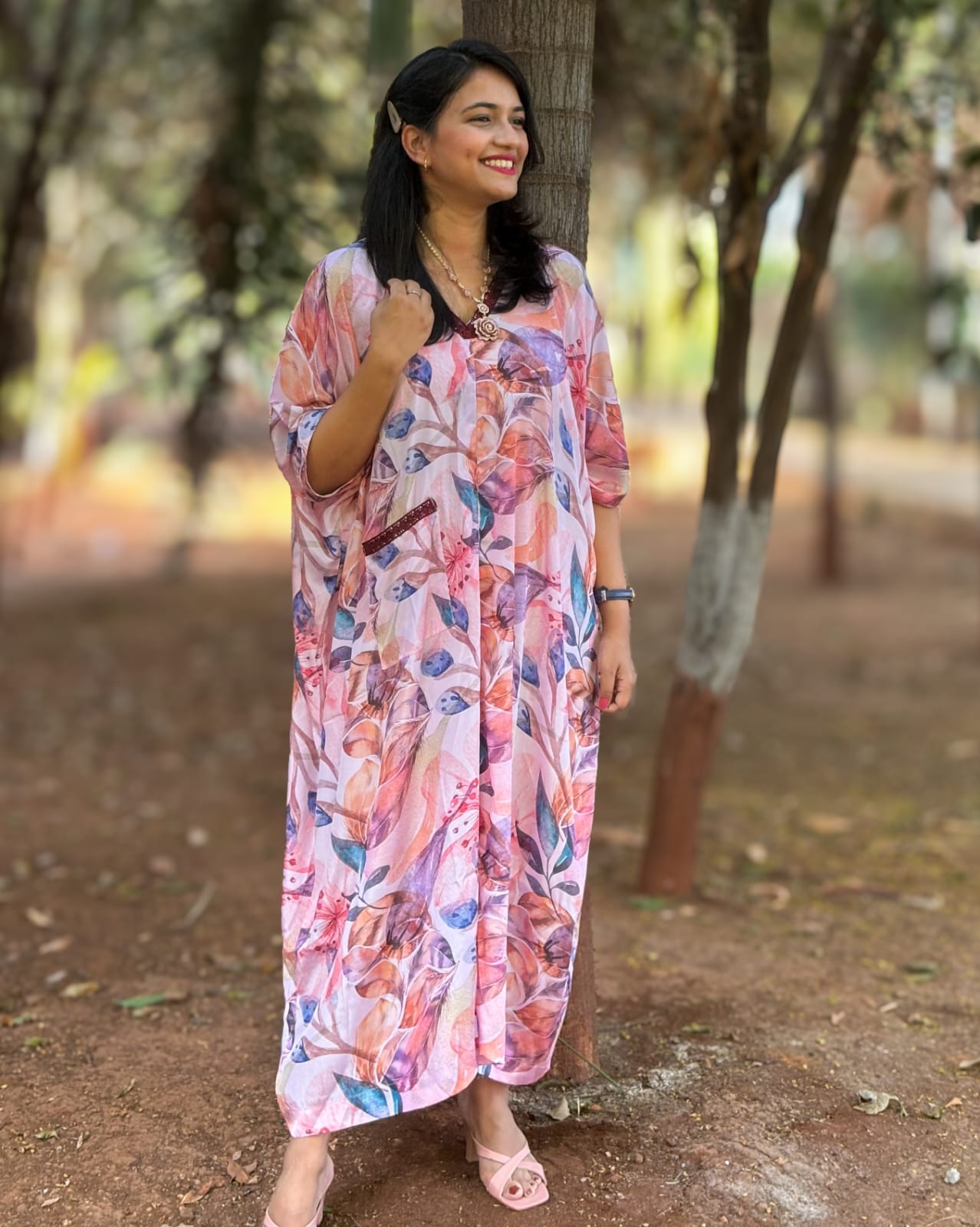 Pink Kaftan with vibrant floral print inspired by Coral Cove. Perfect for everyday outings, adding joy and confidence to your wardrobe. #PinkKaftan #CoralCoveInspired #FloralPrint #Fashionista #ConfidenceBoost
