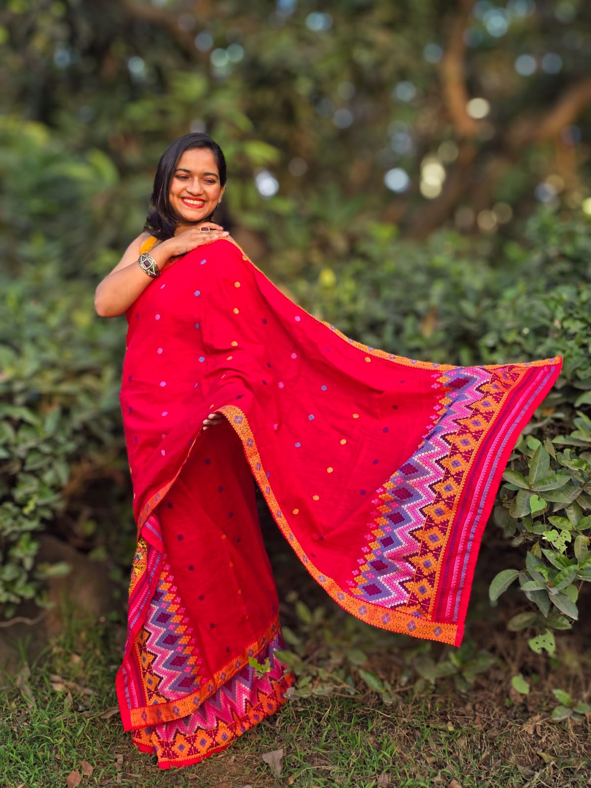 Authentic Red Mishing Mekhela Chador with traditional Agun Mirizim handwoven motifs.