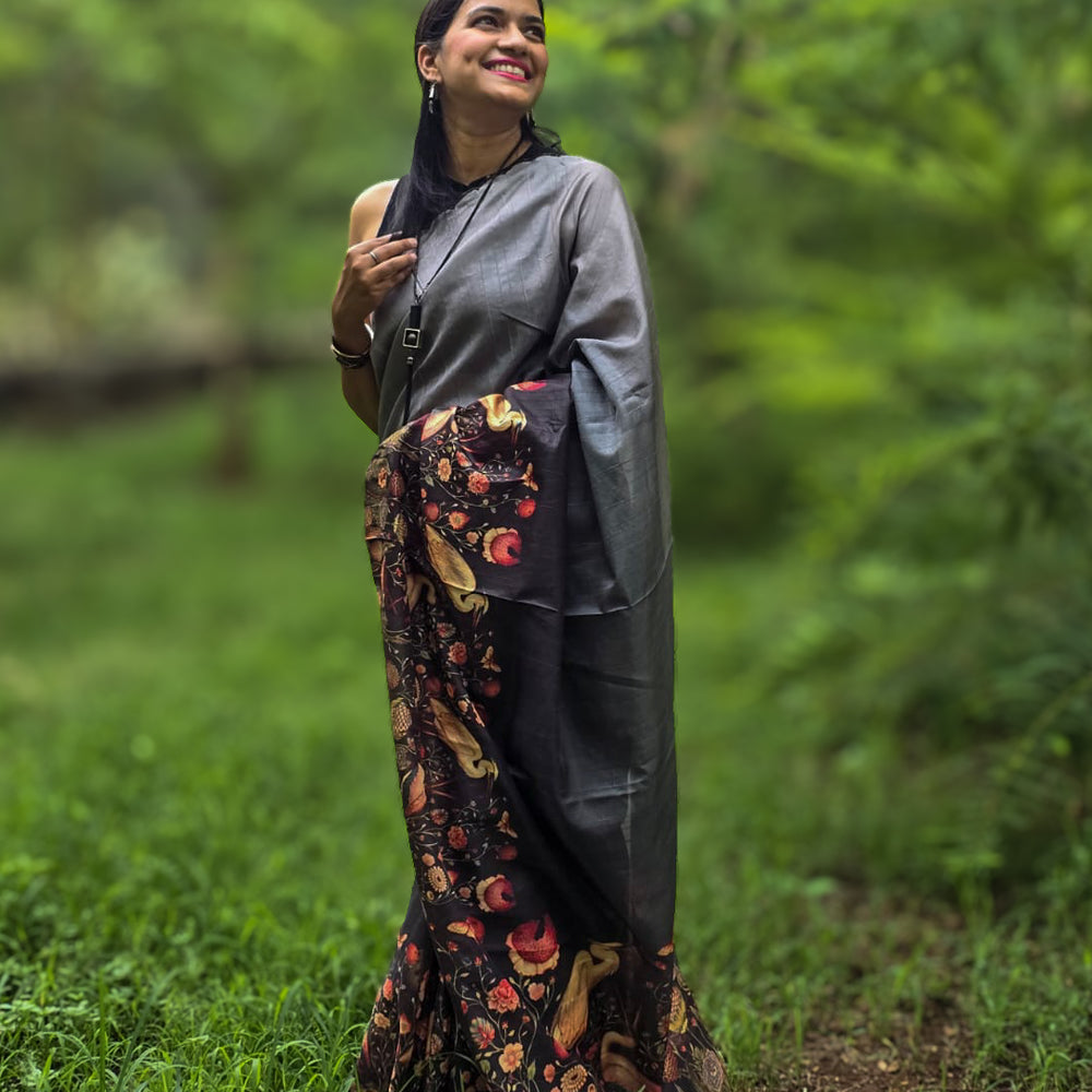 
                      
                        Model wearing Hahim Tussar silk saree by Apaapi, handwoven in Assam and inspired by the Great Hornbill of Kaziranga. Elegant animal-motif saree in earthy silk tones symbolizing grace and freedom
                      
                    
