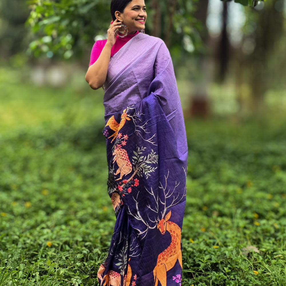 
                      
                        Model wearing Aaranya Tussar silk saree by Apaapi, inspired by Assam’s forests and Kaziranga wildlife. Handwoven Tussar with subtle animal print motifs in earth tones.
                      
                    