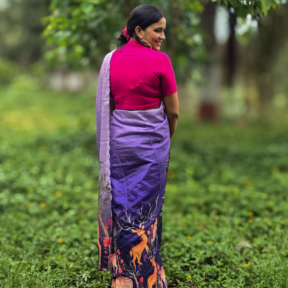 
                      
                        Model wearing Aaranya Tussar silk saree by Apaapi, inspired by Assam’s forests and Kaziranga wildlife. Handwoven Tussar with subtle animal print motifs in earth tones.
                      
                    