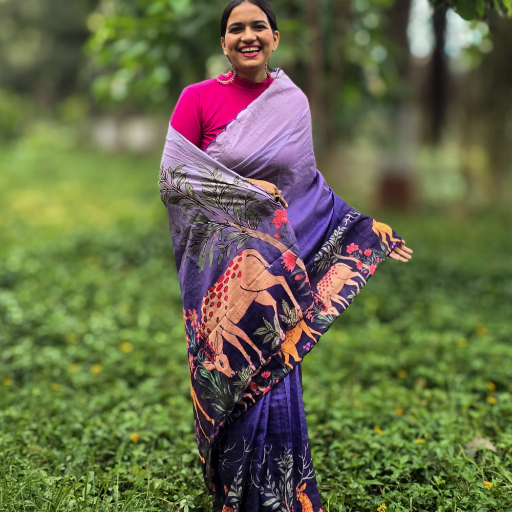 
                      
                        Model wearing Aaranya Tussar silk saree by Apaapi, inspired by Assam’s forests and Kaziranga wildlife. Handwoven Tussar with subtle animal print motifs in earth tones.
                      
                    
