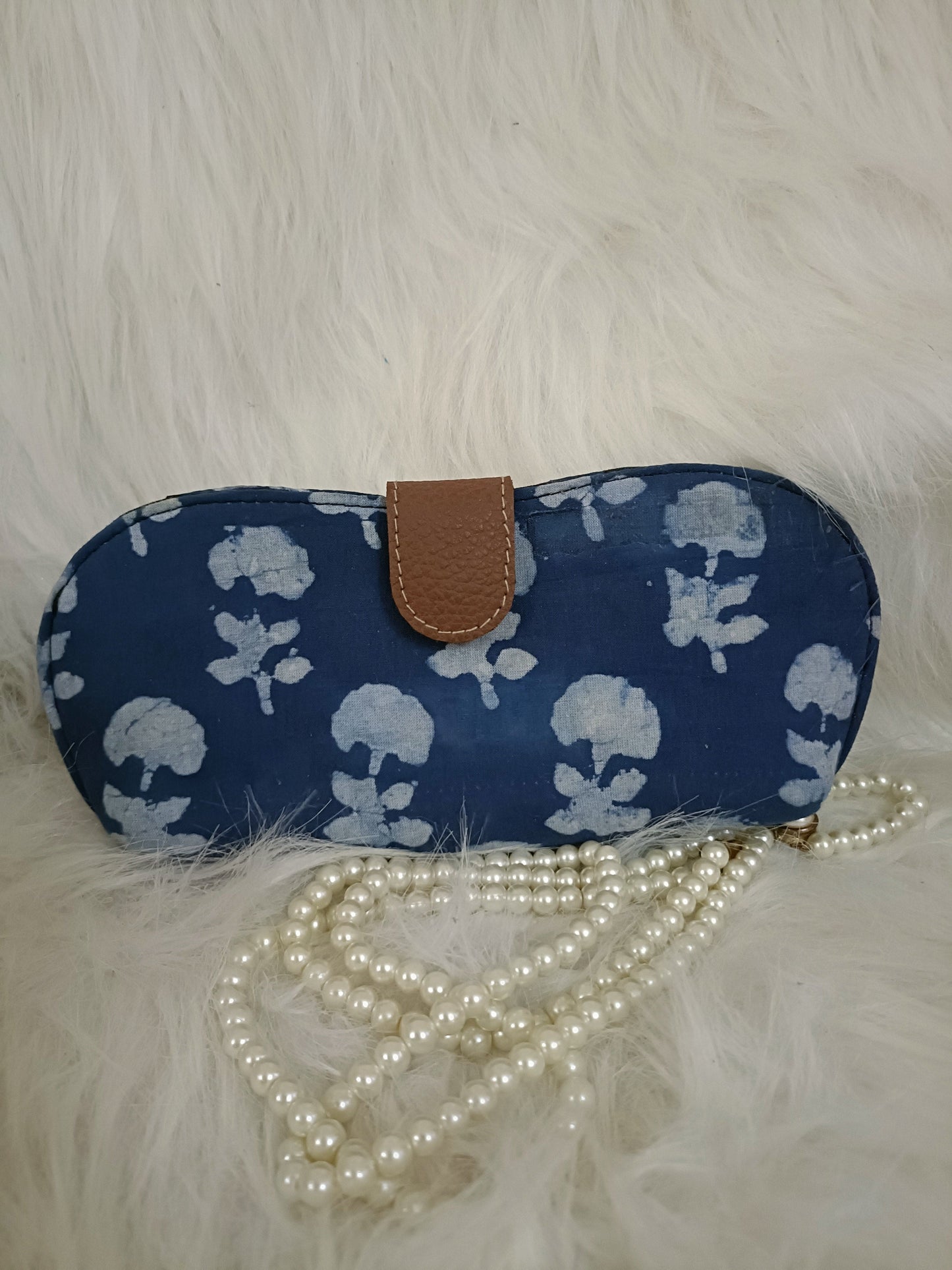 blue fabric sunglass cover