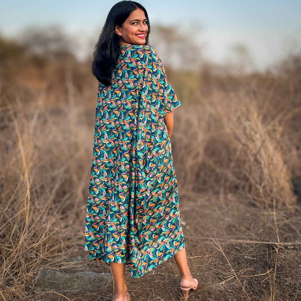 
                      
                         Crepe Kaftan Dress inspired by Water Hyacinth in tropical lagoons. Free-flowing and stylish, offering comfort and elegance. Perfect for all occasions with a unique vibrant floral print. #CrepeKaftan #TropicalFashion #WaterHyacinthPrint #SummerStyle
                      
                    