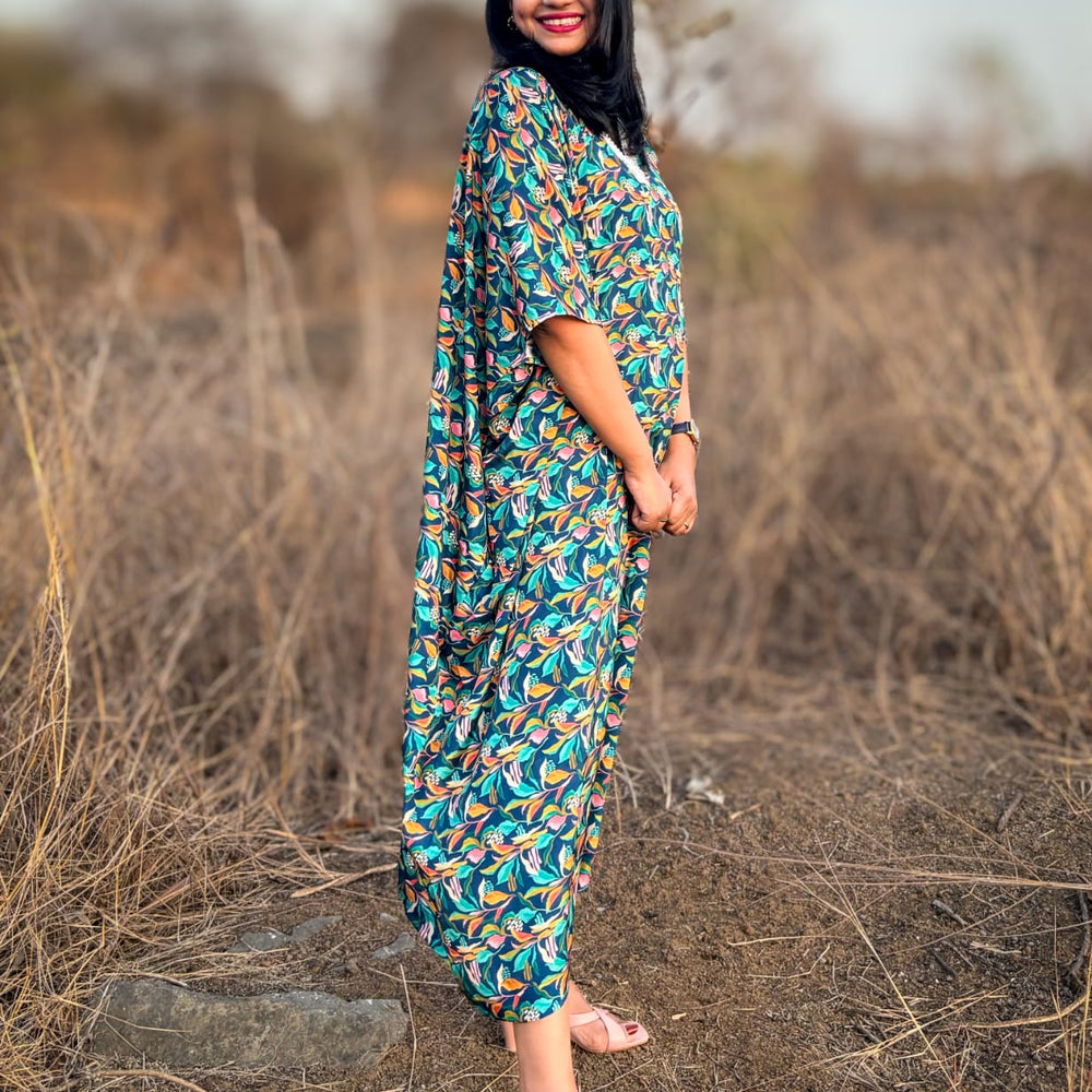 
                      
                         Crepe Kaftan Dress inspired by Water Hyacinth in tropical lagoons. Free-flowing and stylish, offering comfort and elegance. Perfect for all occasions with a unique vibrant floral print. #CrepeKaftan #TropicalFashion #WaterHyacinthPrint #SummerStyle
                      
                    