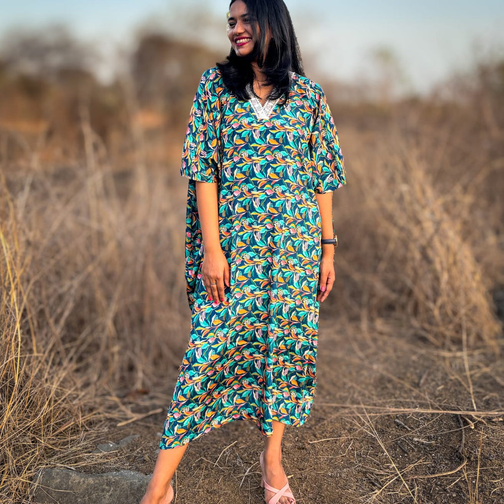 
                      
                         Crepe Kaftan Dress inspired by Water Hyacinth in tropical lagoons. Free-flowing and stylish, offering comfort and elegance. Perfect for all occasions with a unique vibrant floral print. #CrepeKaftan #TropicalFashion #WaterHyacinthPrint #SummerStyle
                      
                    