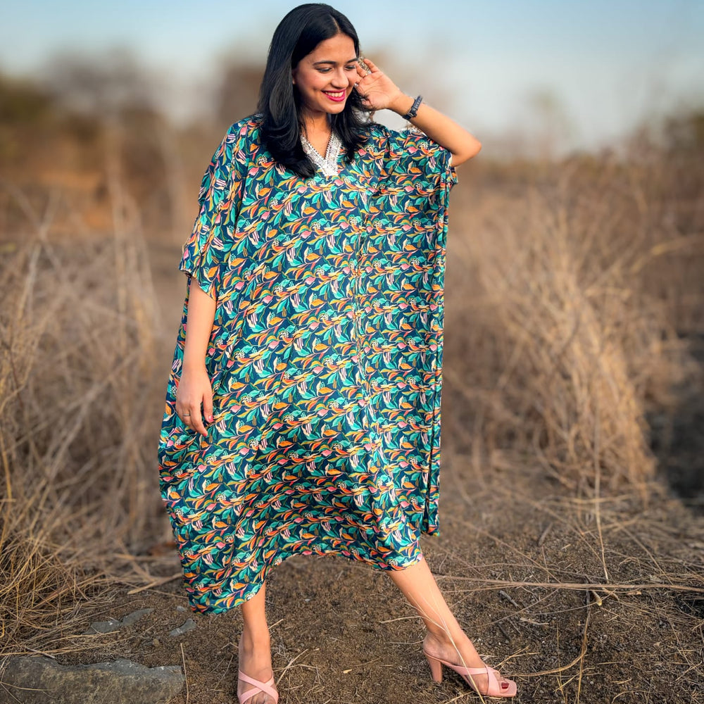 
                      
                         Crepe Kaftan Dress inspired by Water Hyacinth in tropical lagoons. Free-flowing and stylish, offering comfort and elegance. Perfect for all occasions with a unique vibrant floral print. #CrepeKaftan #TropicalFashion #WaterHyacinthPrint #SummerStyle
                      
                    