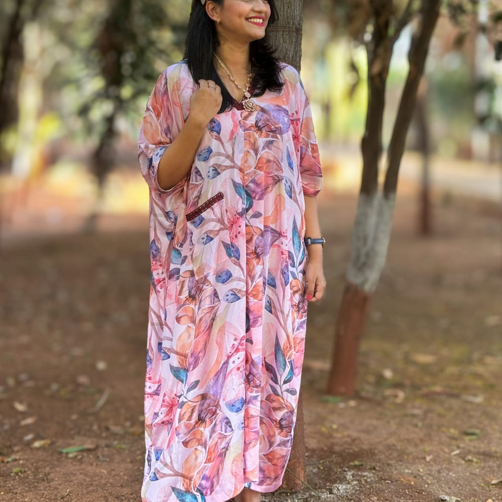 Pink Kaftan with vibrant floral print inspired by Coral Cove. Perfect for everyday outings, adding joy and confidence to your wardrobe. #PinkKaftan #CoralCoveInspired #FloralPrint #Fashionista #ConfidenceBoost