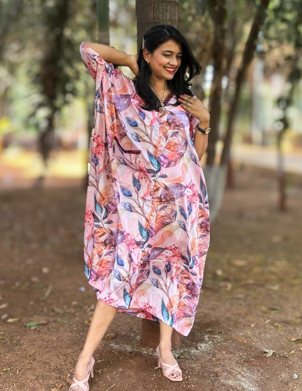 Pink Kaftan with vibrant floral print inspired by Coral Cove. Perfect for everyday outings, adding joy and confidence to your wardrobe. #PinkKaftan #CoralCoveInspired #FloralPrint #Fashionista #ConfidenceBoost