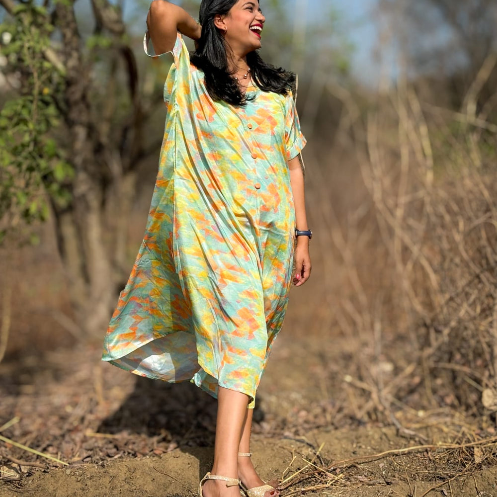 Free-flowing, free size Kaftan dress inspired by the blue sky and summer floral print. Perfect for beach outings and garden parties. #KaftanFashion #SummerStyle #FloralPrint #BlueSkyInspired #Fashionista