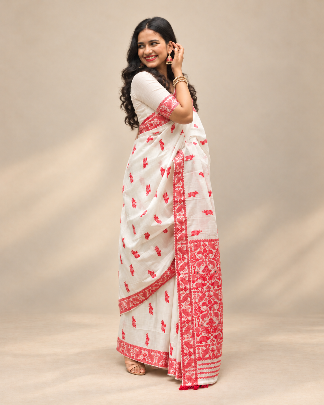 White rhino motif Assam saree styled for Bihu, cultural events and contemporary festive wear