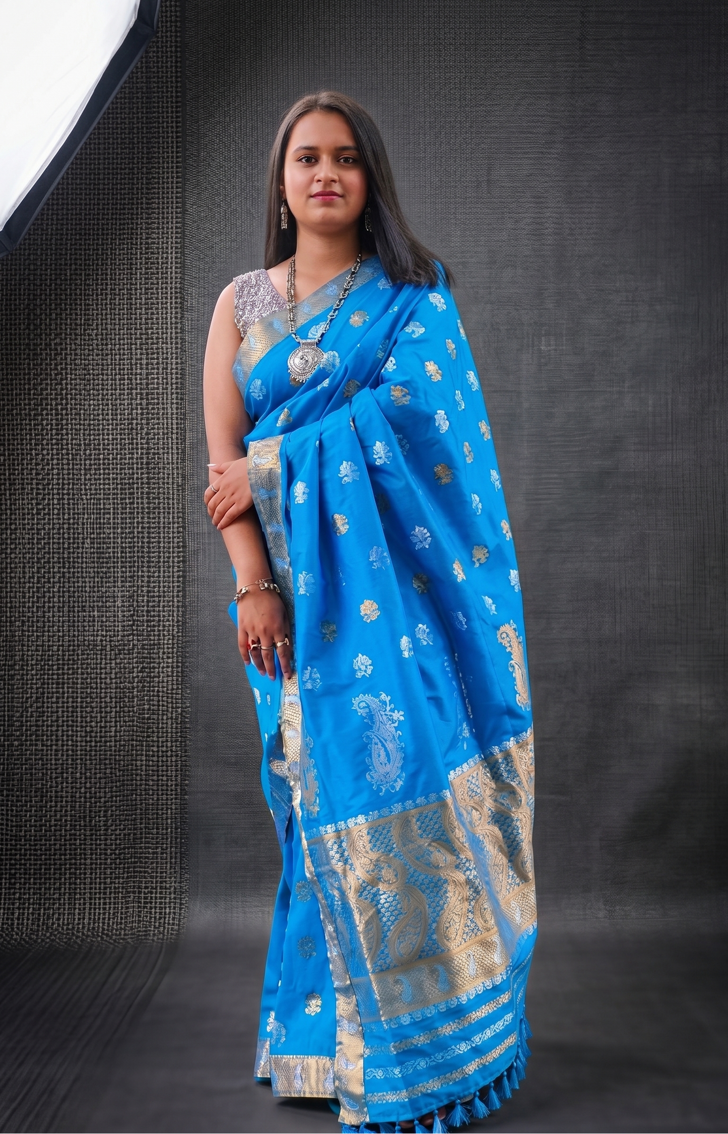 Aakashi blue Assam silk blend saree with traditional kalak motif front view for festive and traditional wear