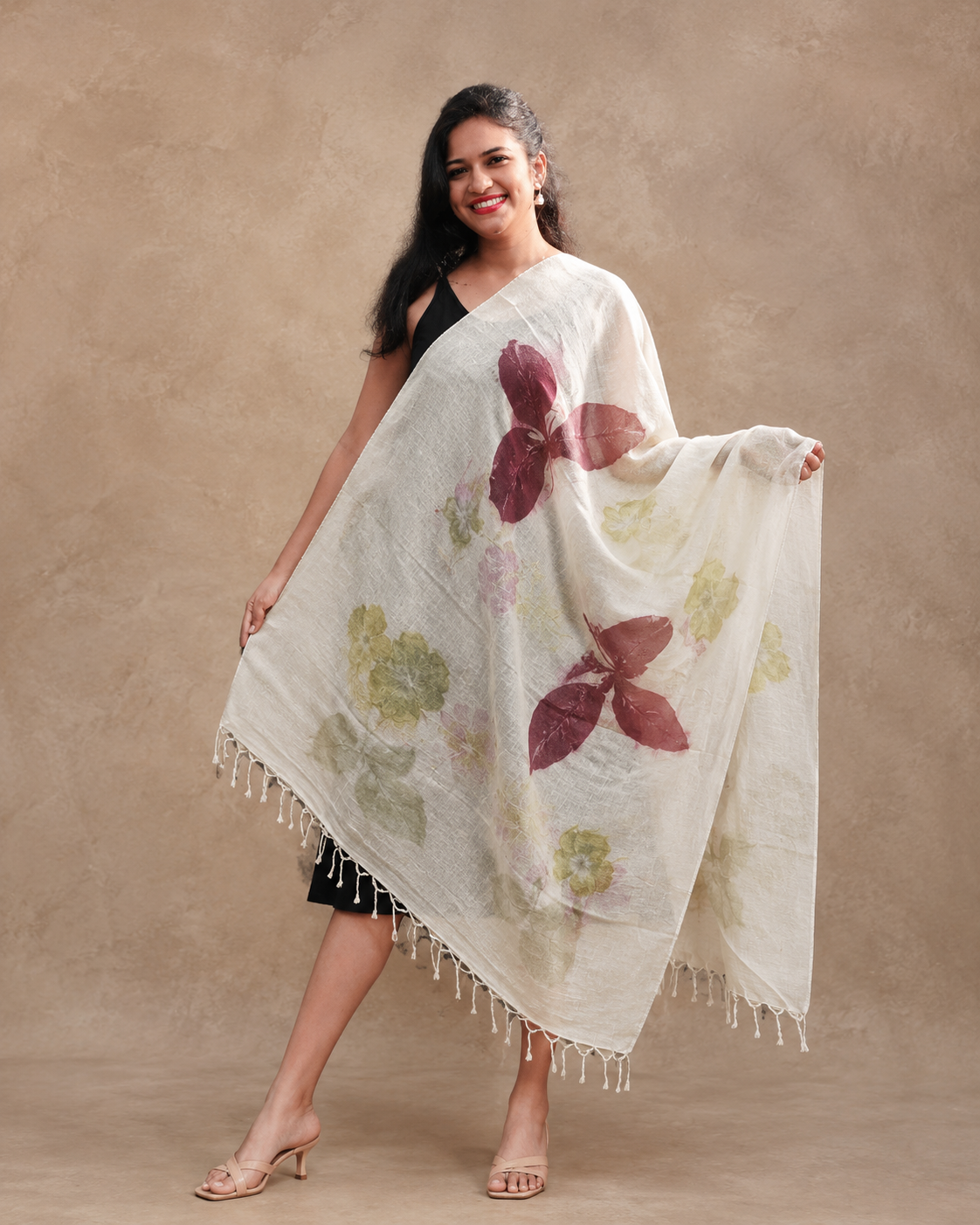 White handwoven cotton stole from Assam with botanical leaf print