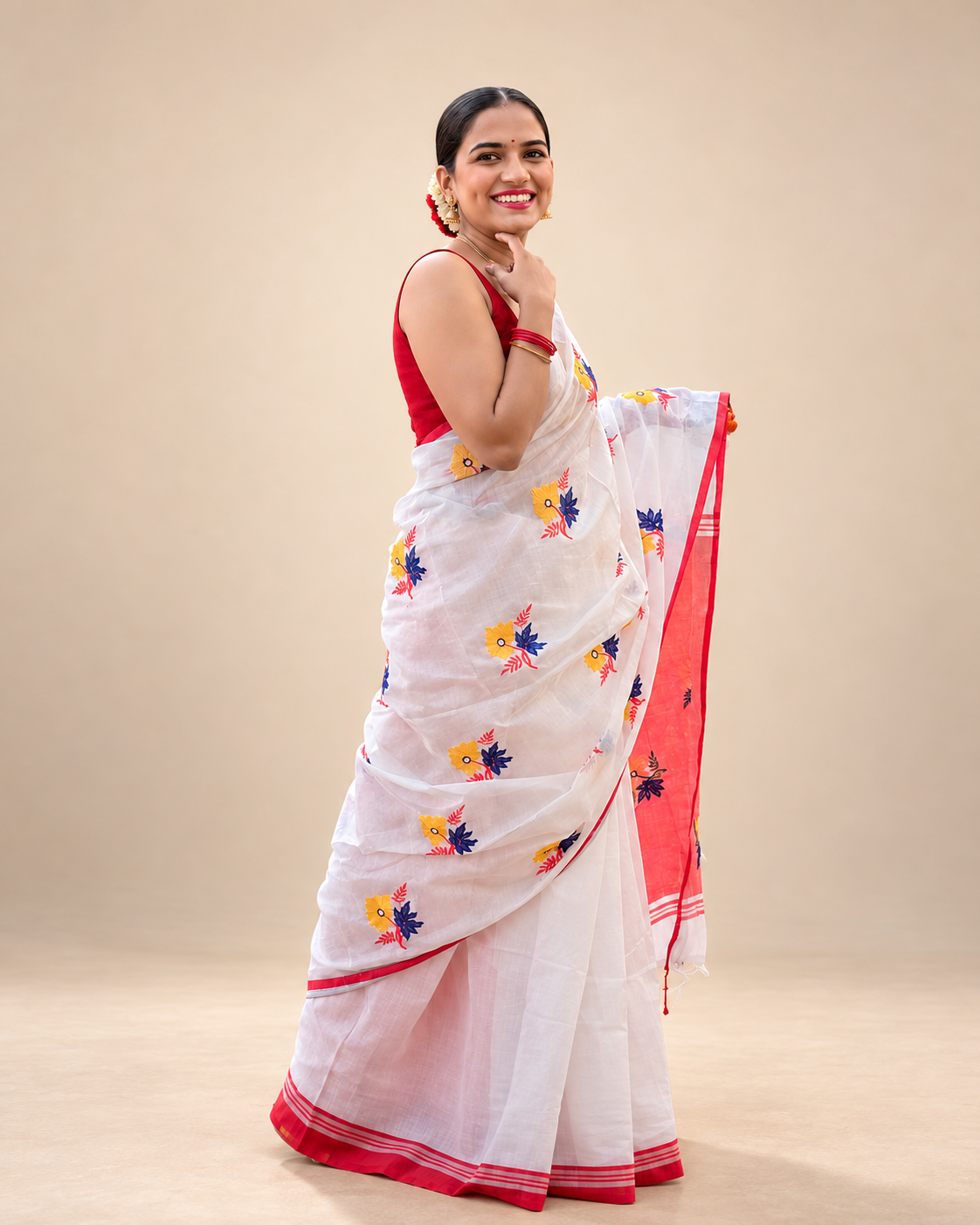 Dudhnoi Xondhiya Assam-inspired floral saree styled for festive evening wear.