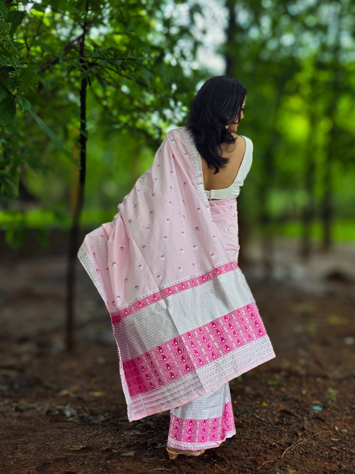 Handwoven pink mixed silk Mekhela Chador from Assam with silver woven border