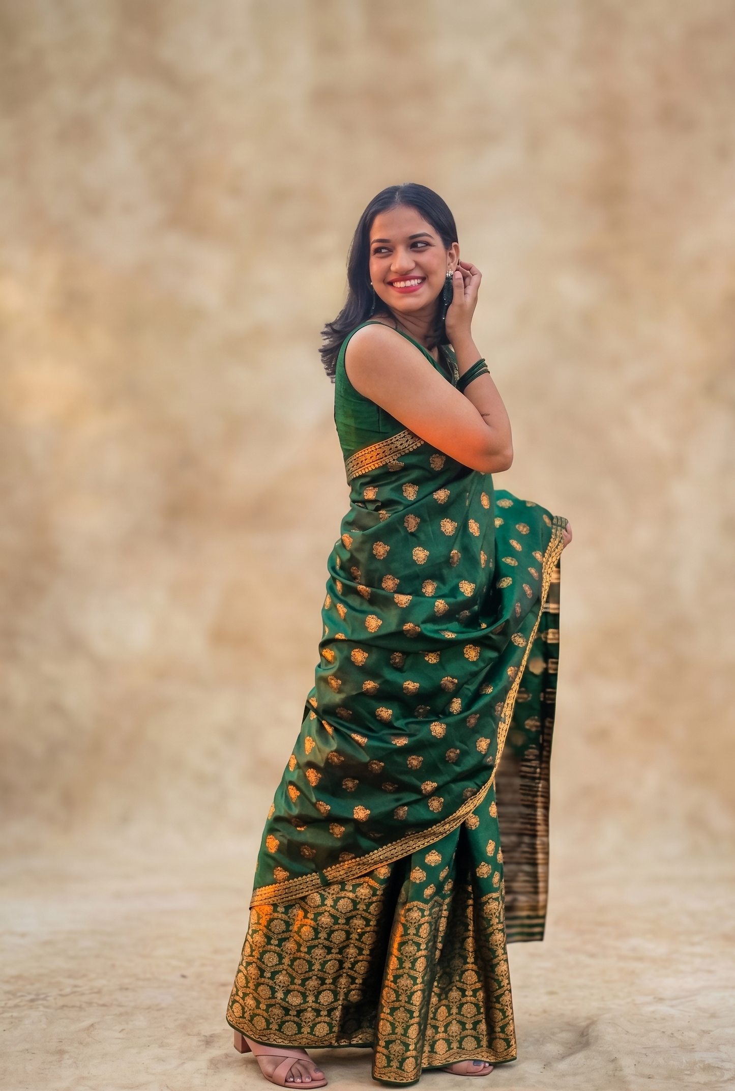 Full length look of fully stitched green Assam silk Mekhela Chador for festive and wedding wear