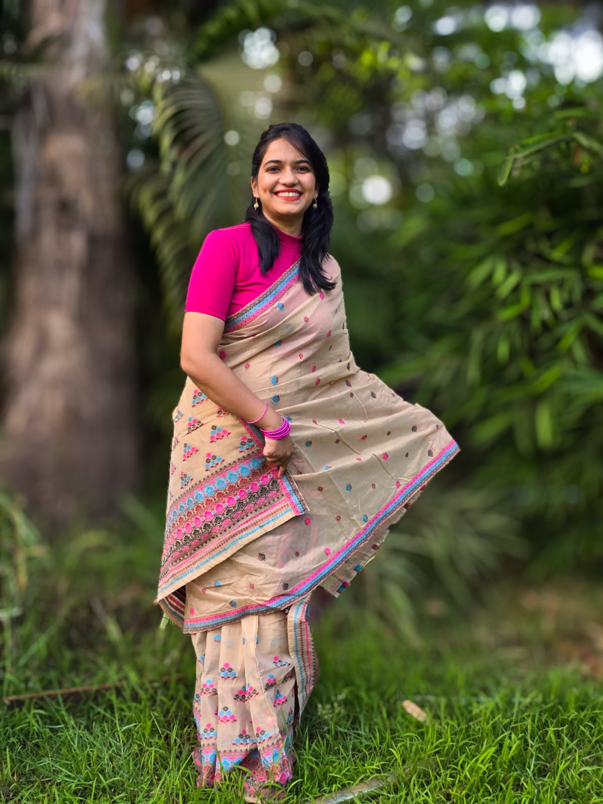 Handwoven beige cotton Mekhela Chador from Assam with multicolour woven motifs and traditional border