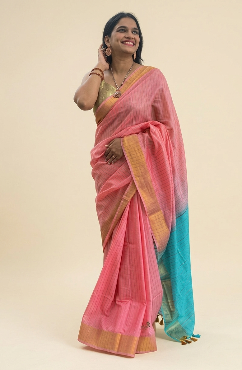 Light pink silk cotton saree with contrast light blue pallu and blouse piece