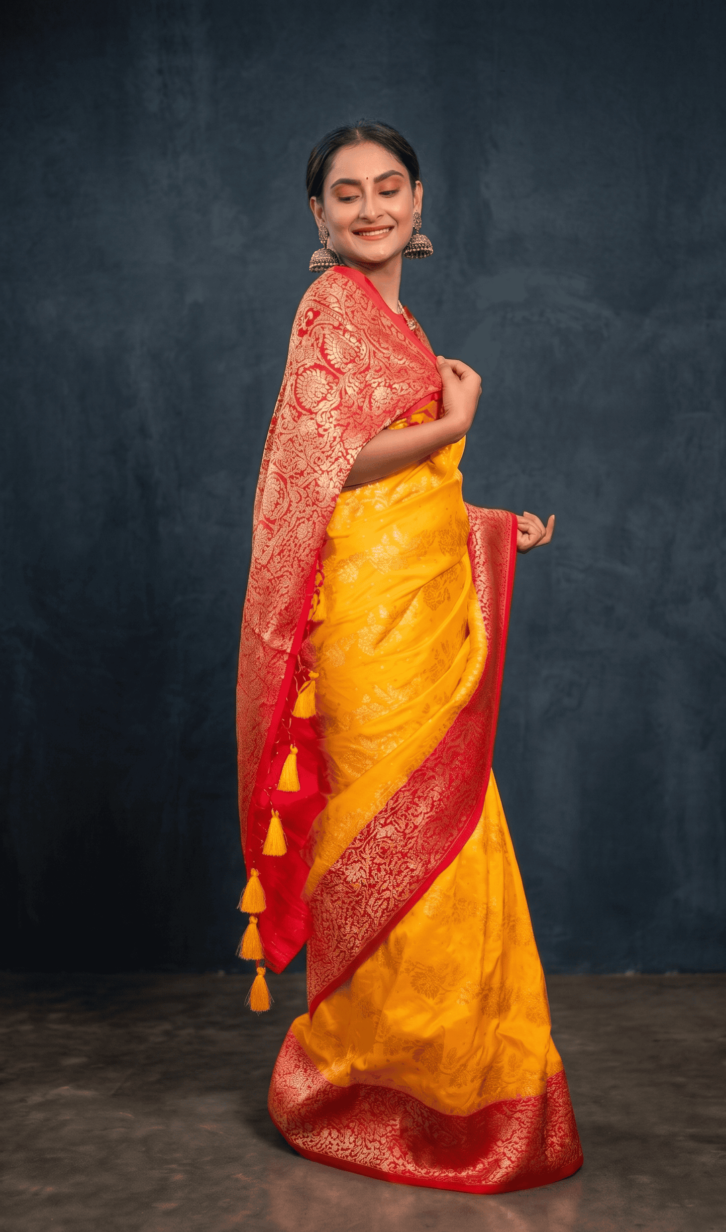 Side view of Madhurima yellow Banarasi silk jacquard saree with elegant traditional styling