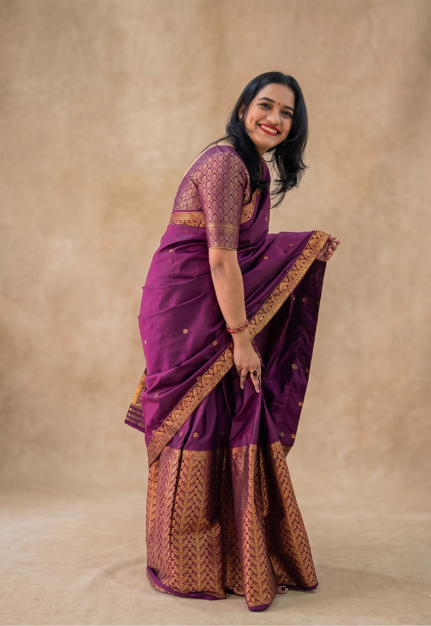 Side drape of Mayurima wine silk blend Assamese Mekhela Chador ready to wear
