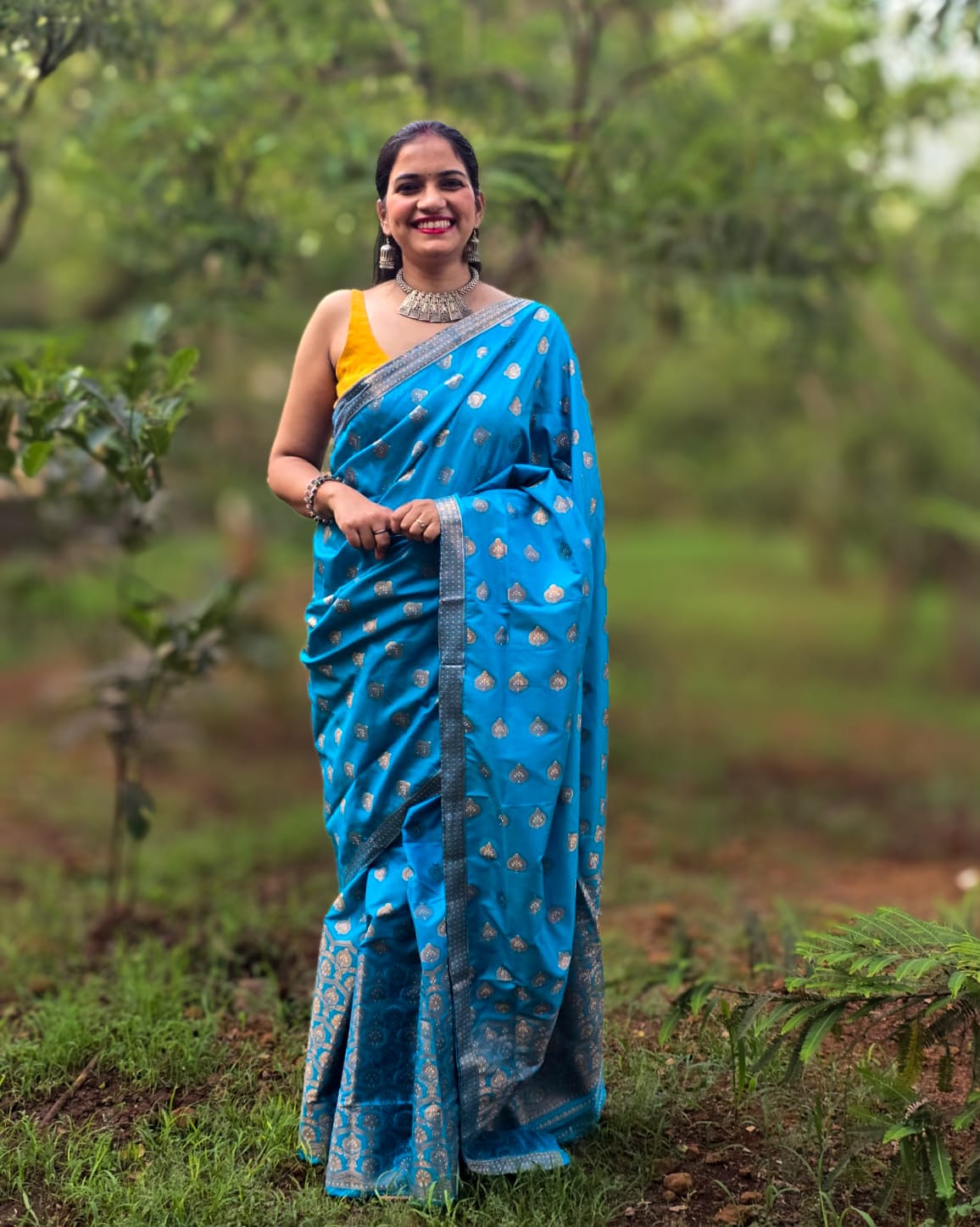 Woven blue Mekhela Chador from Assam with golden woven motifs