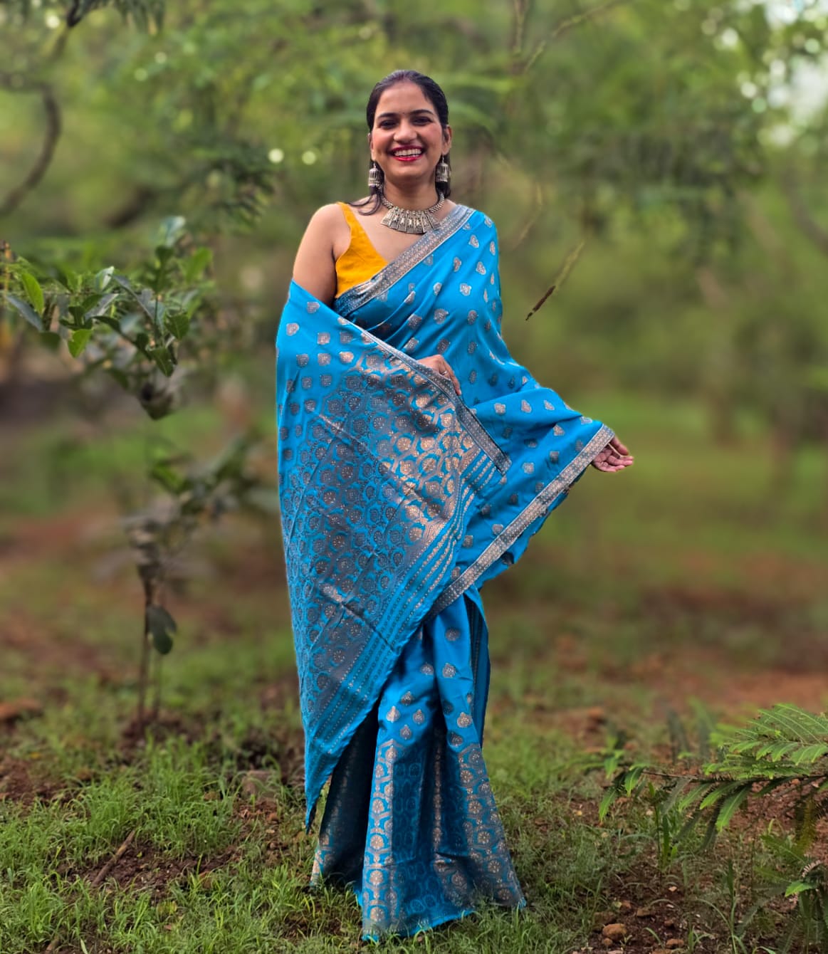 Woven blue Mekhela Chador from Assam with golden woven motifs