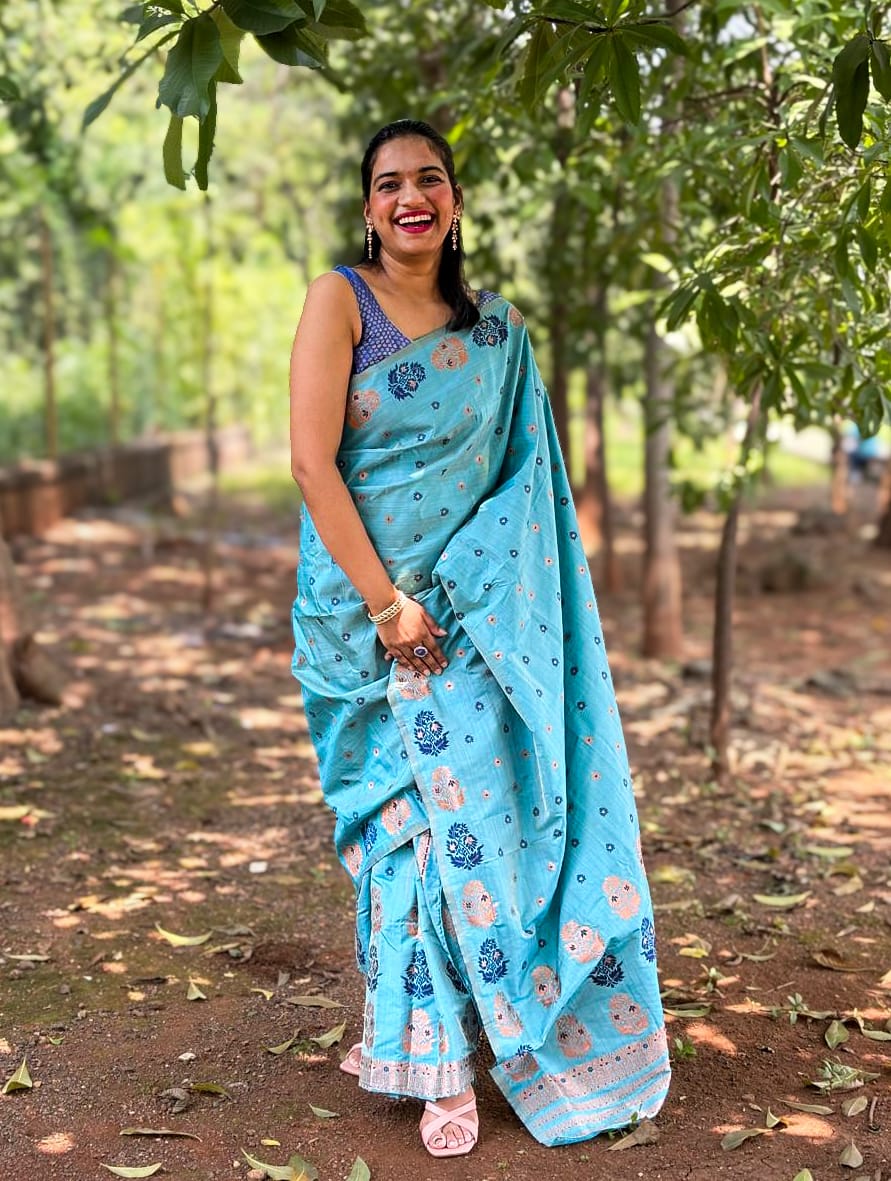 Handwoven sky blue Mekhela Chador from Assam with floral woven motifs