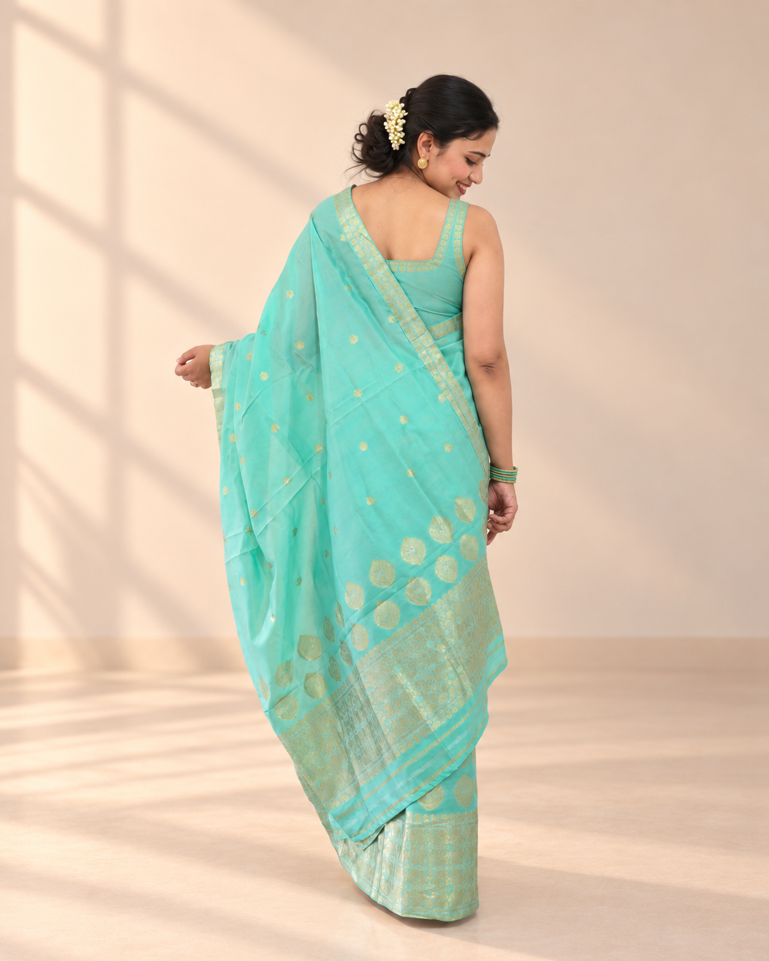 Aqua mint mixed silk Mekhela Chador styled for daytime weddings and wedding guest wear