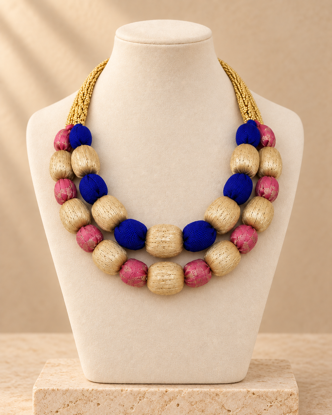 Panesoi blue and pink handmade fabric necklace with Muga thread from Assam