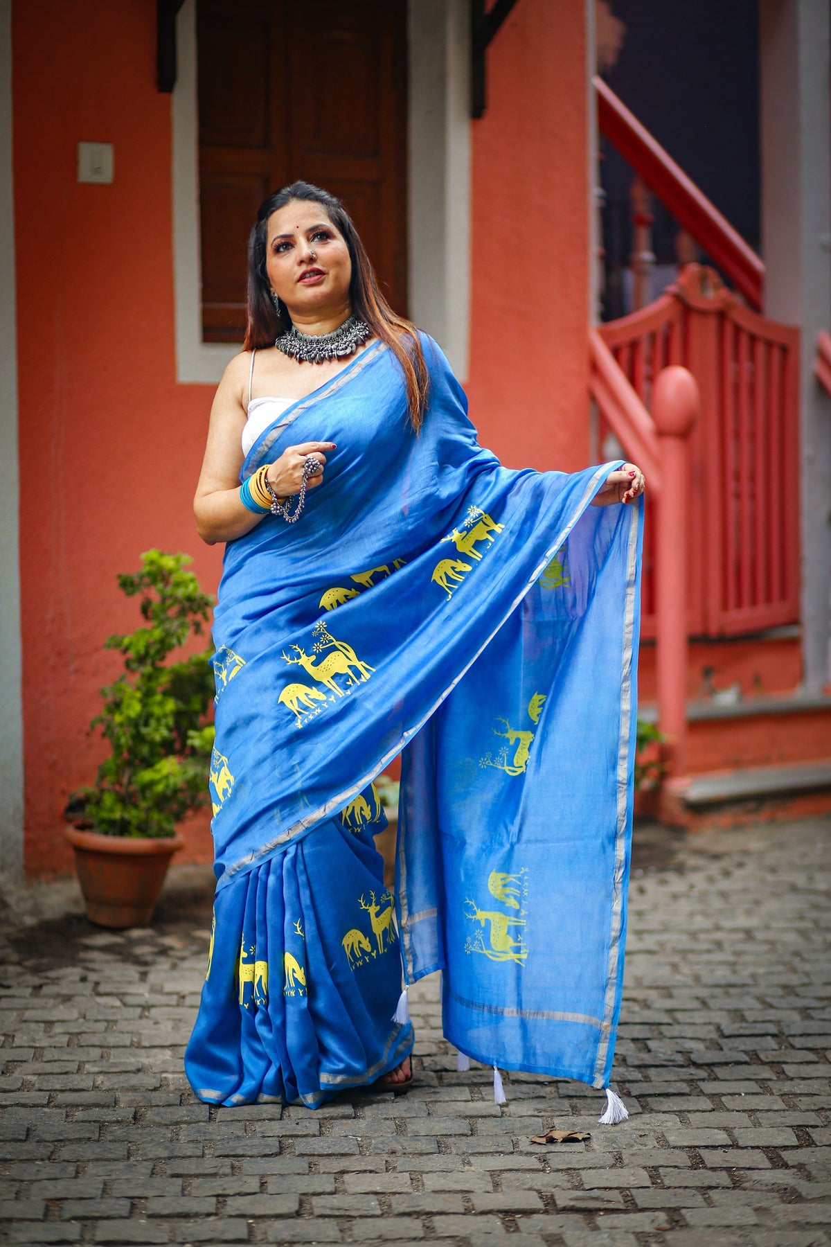PANSHI blue Chanderi silk saree by Apaapi inspired by Assam’s rivers and traditional deers.