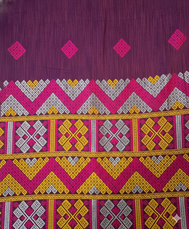 Full view of the Dawn Ligang pink Mekhela Chador set, showcasing the rich traditional borders and authentic Assamese handloom texture.