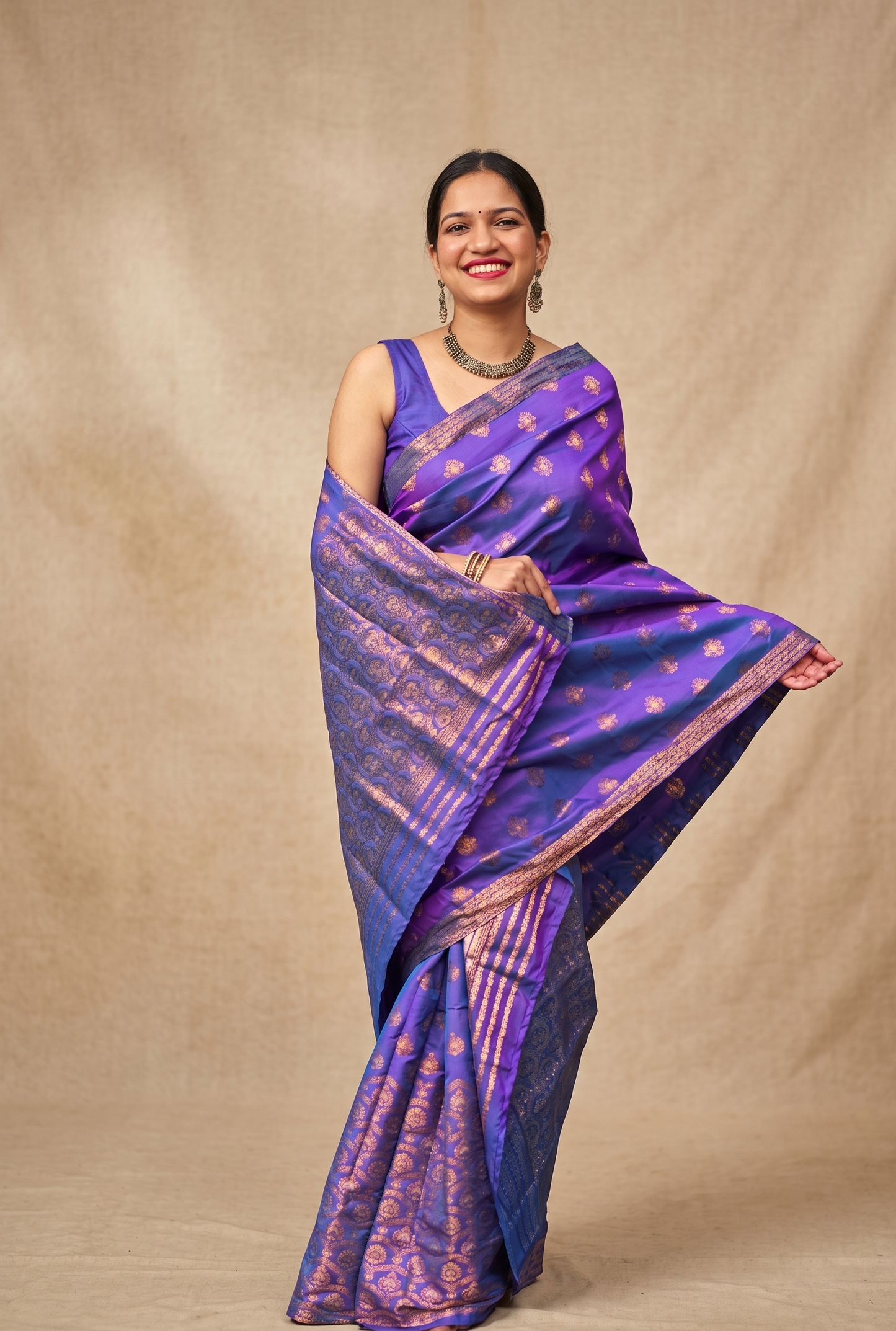 Full length look of fully stitched purple Assam silk Mekhela Chador for festive and wedding wear