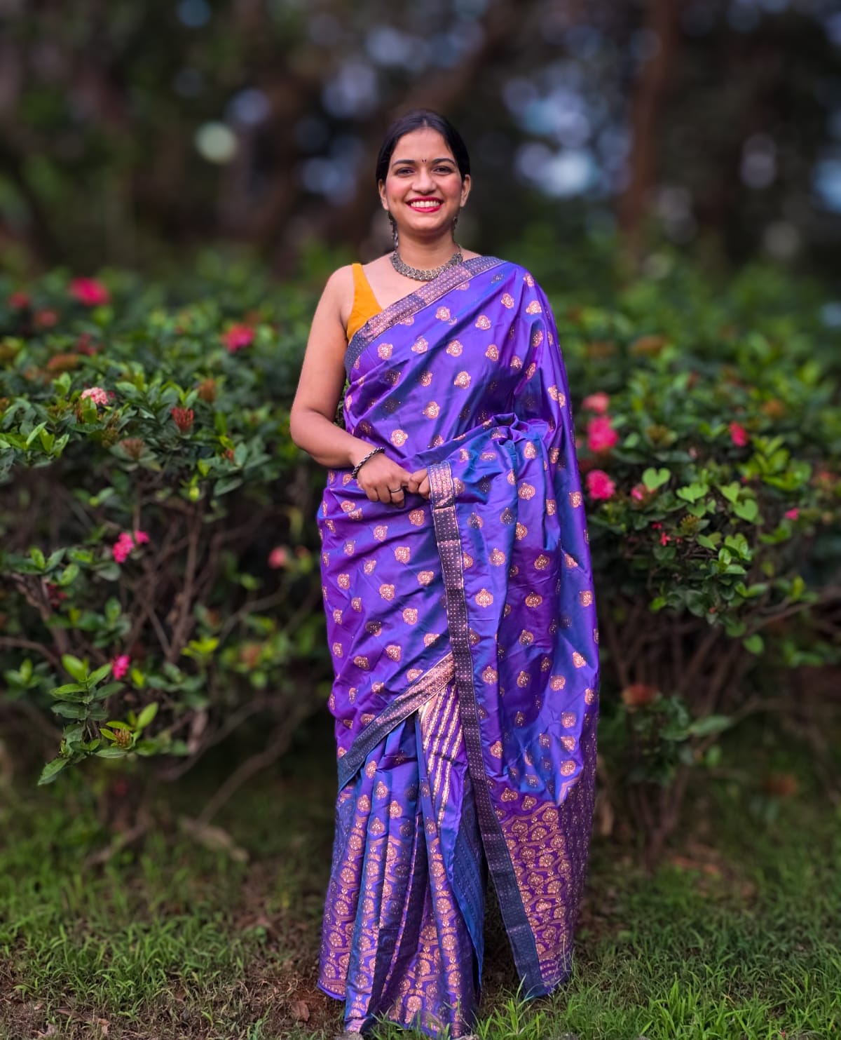 Handwoven royal purple mixed silk Mekhela Chador from Assam with golden motifs