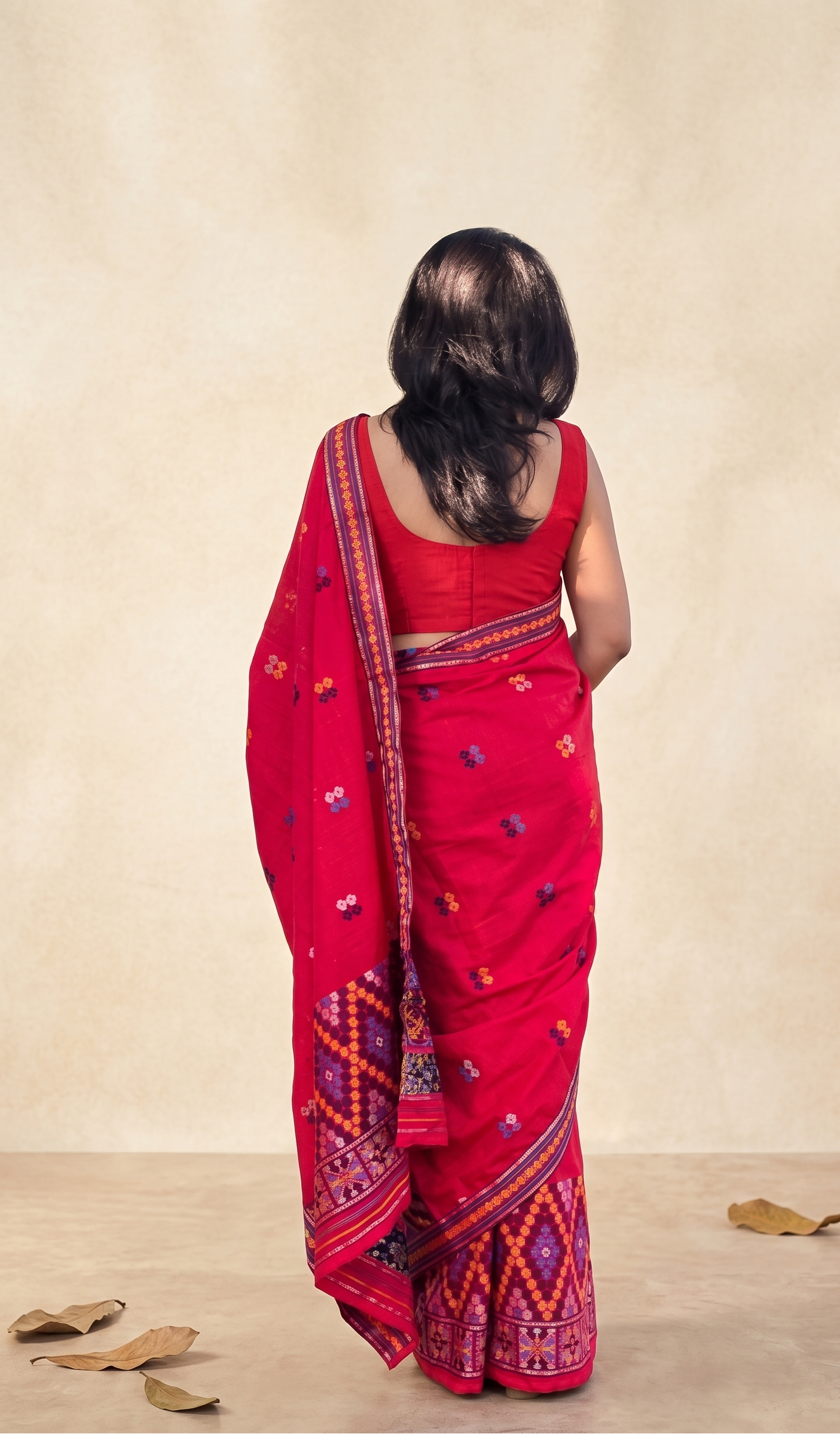 Mishing weave detail on Rengom Rengani red Mekhela Chador