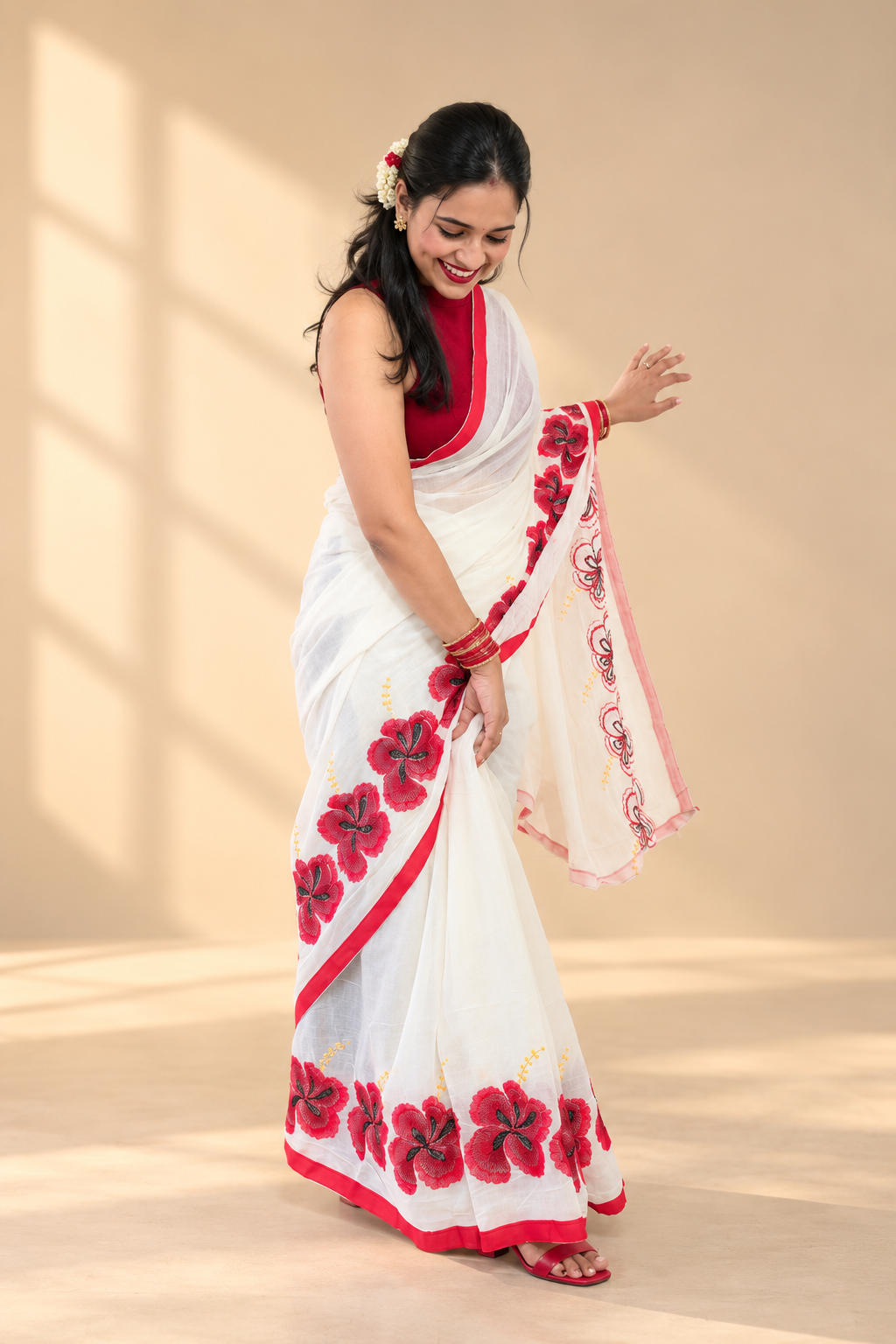 Ronga Joba white saree with red hibiscus-inspired floral motifs by Apaapi.
