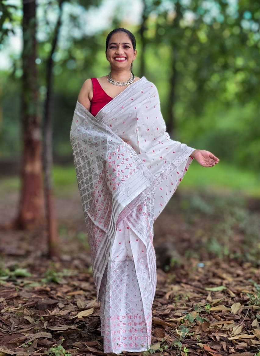 Handwoven white mixed silk Mekhela Chador from Assam with traditional red woven motifs