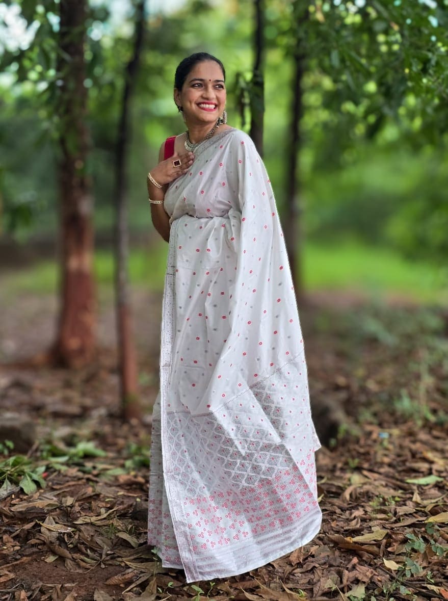 Handwoven white mixed silk Mekhela Chador from Assam with traditional red woven motifs