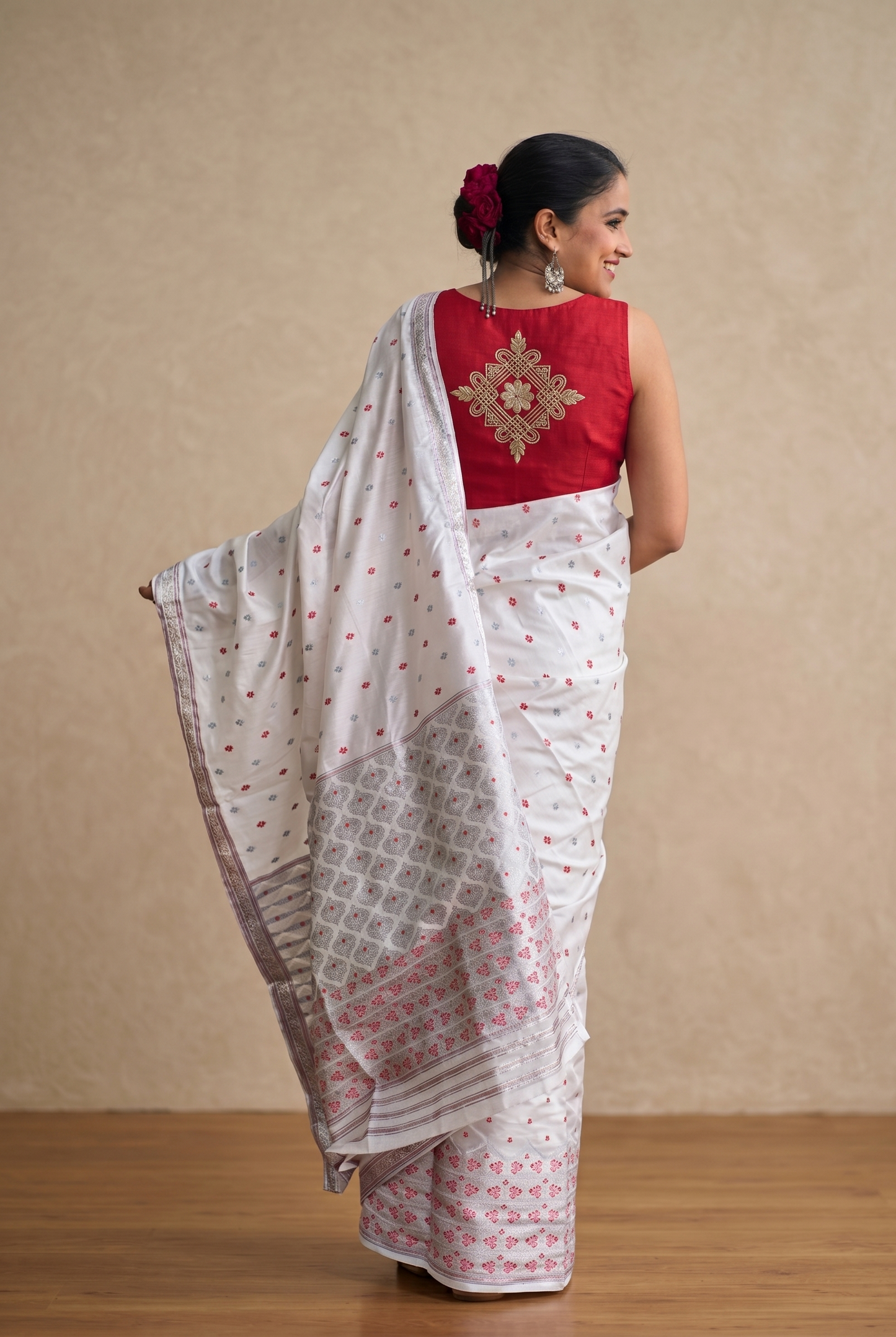 Silver zari motif detail on Rongor Jonaki white silk blend Assamese Mekhela Chador