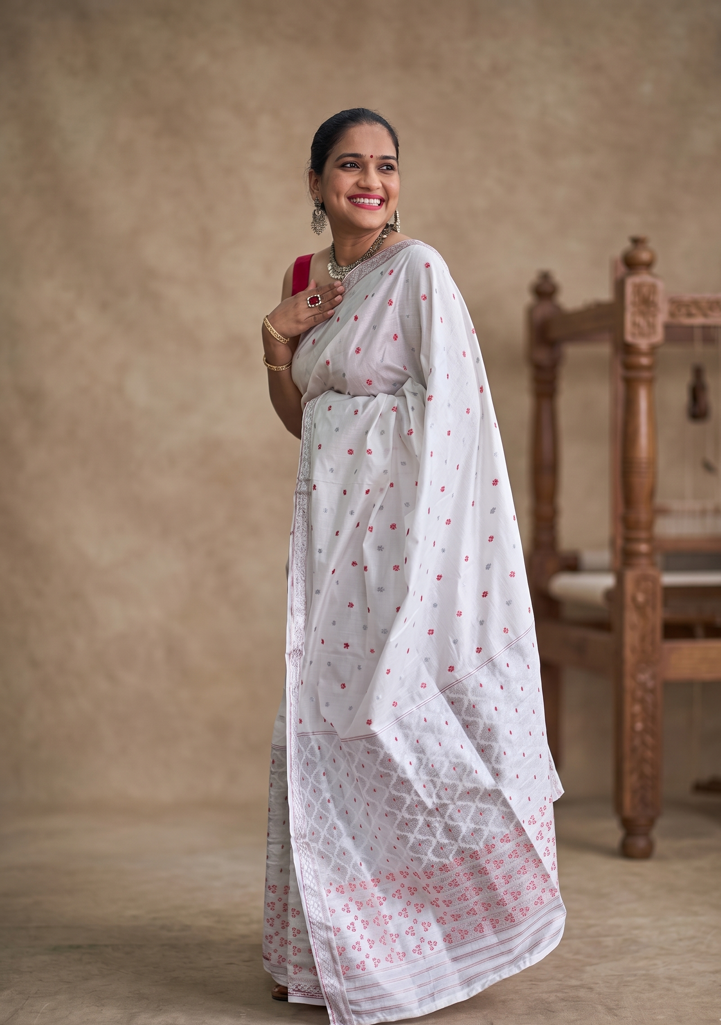 Silver zari motif detail on Rongor Jonaki white silk blend Assamese Mekhela Chador