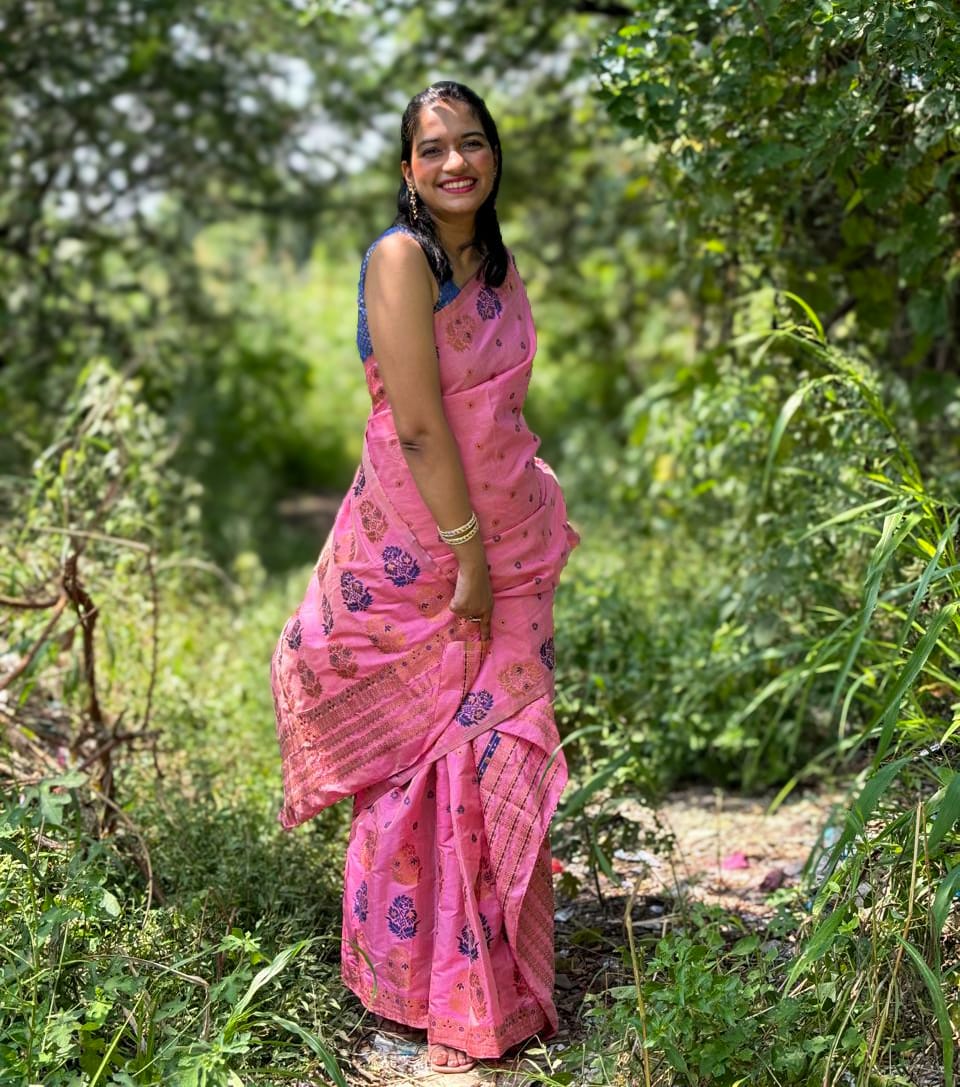 Handwoven rose pink mixed silk Mekhela Chador from Assam with floral woven motifs