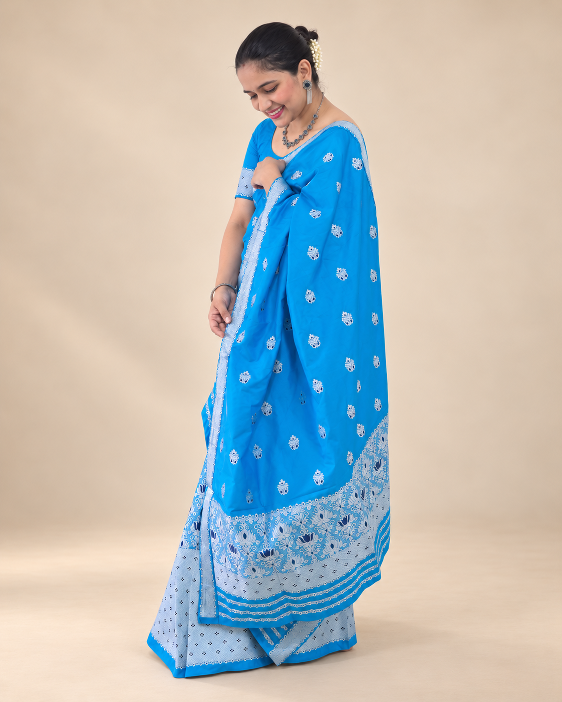 Blue silver zari Mekhela Chador from Assam styled for Assamese weddings and wedding guest wear