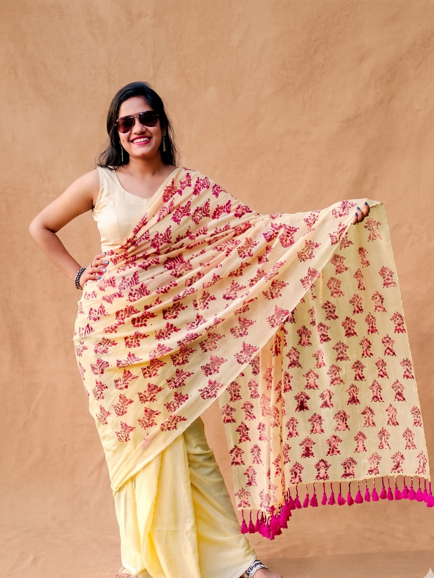 Soft yellow mulmul cotton block printed saree styled for daily wear, office wear, summer outings and puja in India