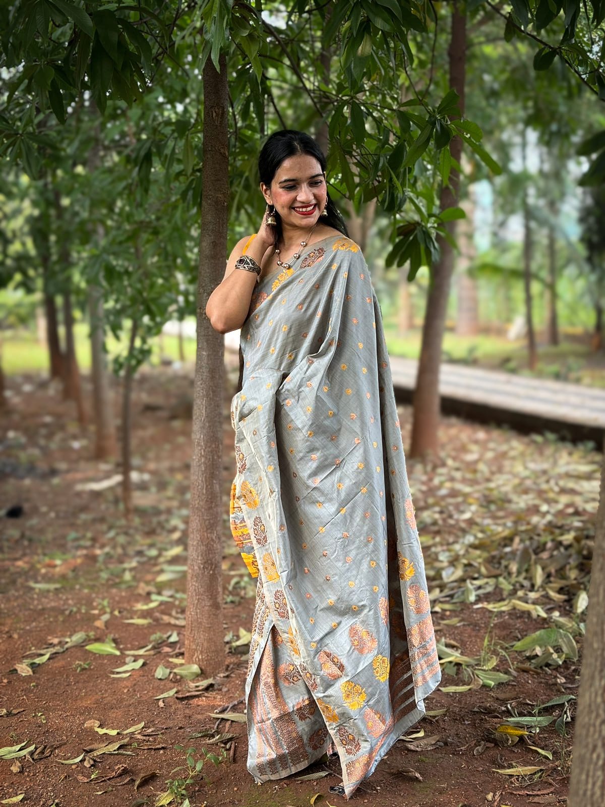 Grey silk Mekhela Chador from Assam with yellow floral motifs for weddings and festive wear