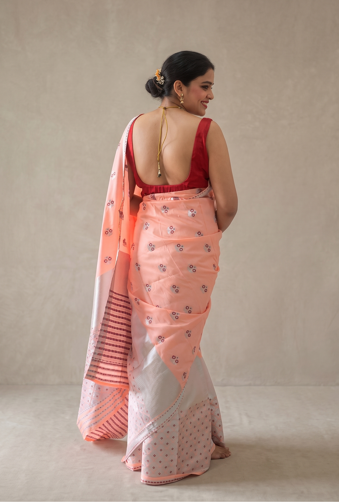 Xuworoni peach silk blend Mekhela Chador fully stitched back look by Apaapi