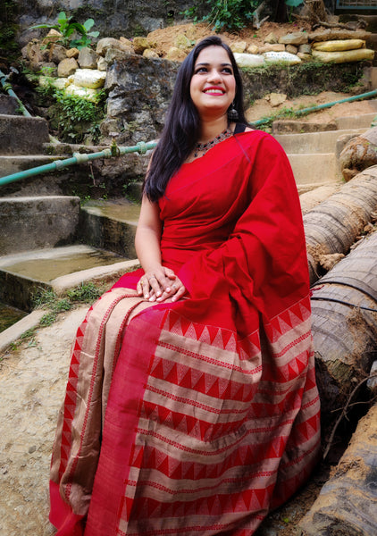Stunning red cotton saree with muga coloured pallu and pleats handwoven with arnai motifs handcrafted for the beautiful you.